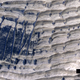Illustration for article titled Nobody knows how these mysterious ridges formed on the surface of Mars